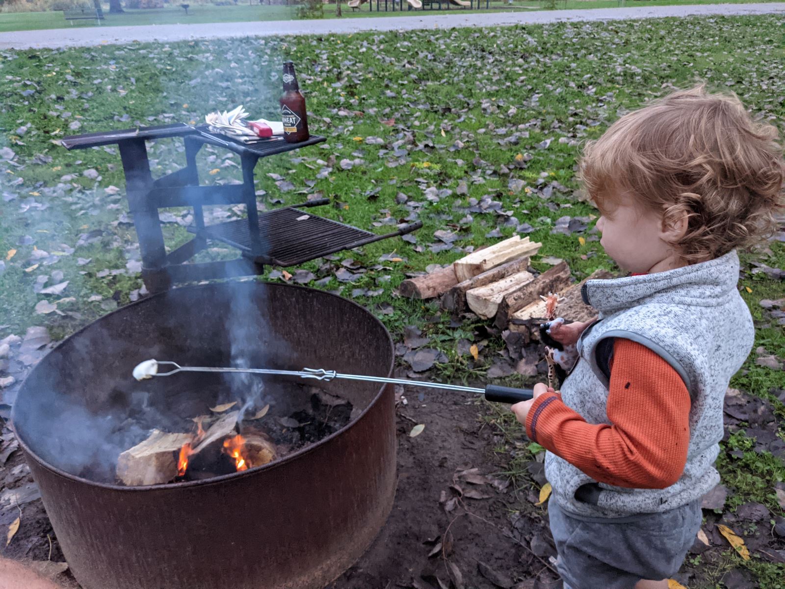 Boy roasting marshmallows
