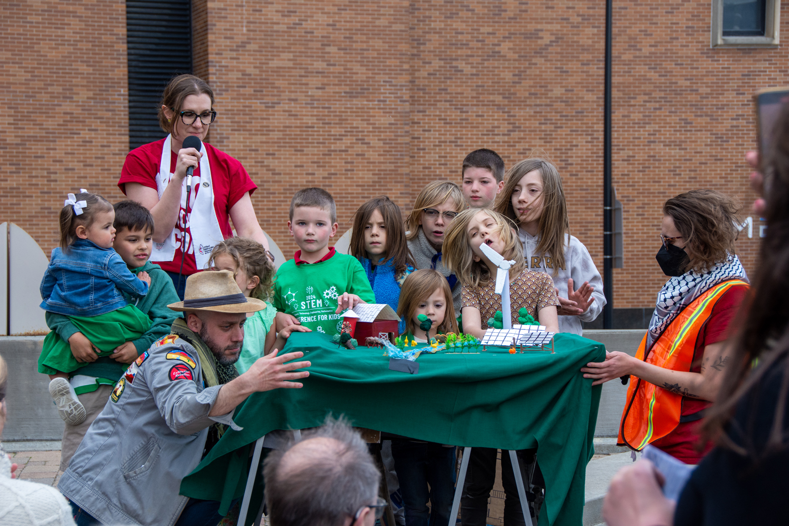 Kids surround table following the flip