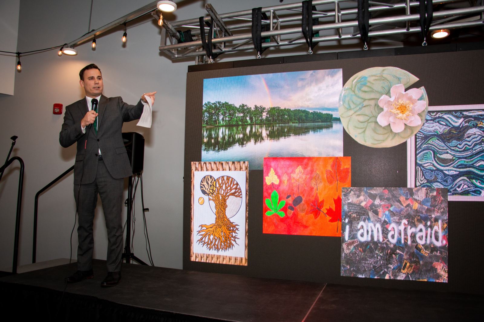 Emcee Chris Gloninger presenting at the Green Gala