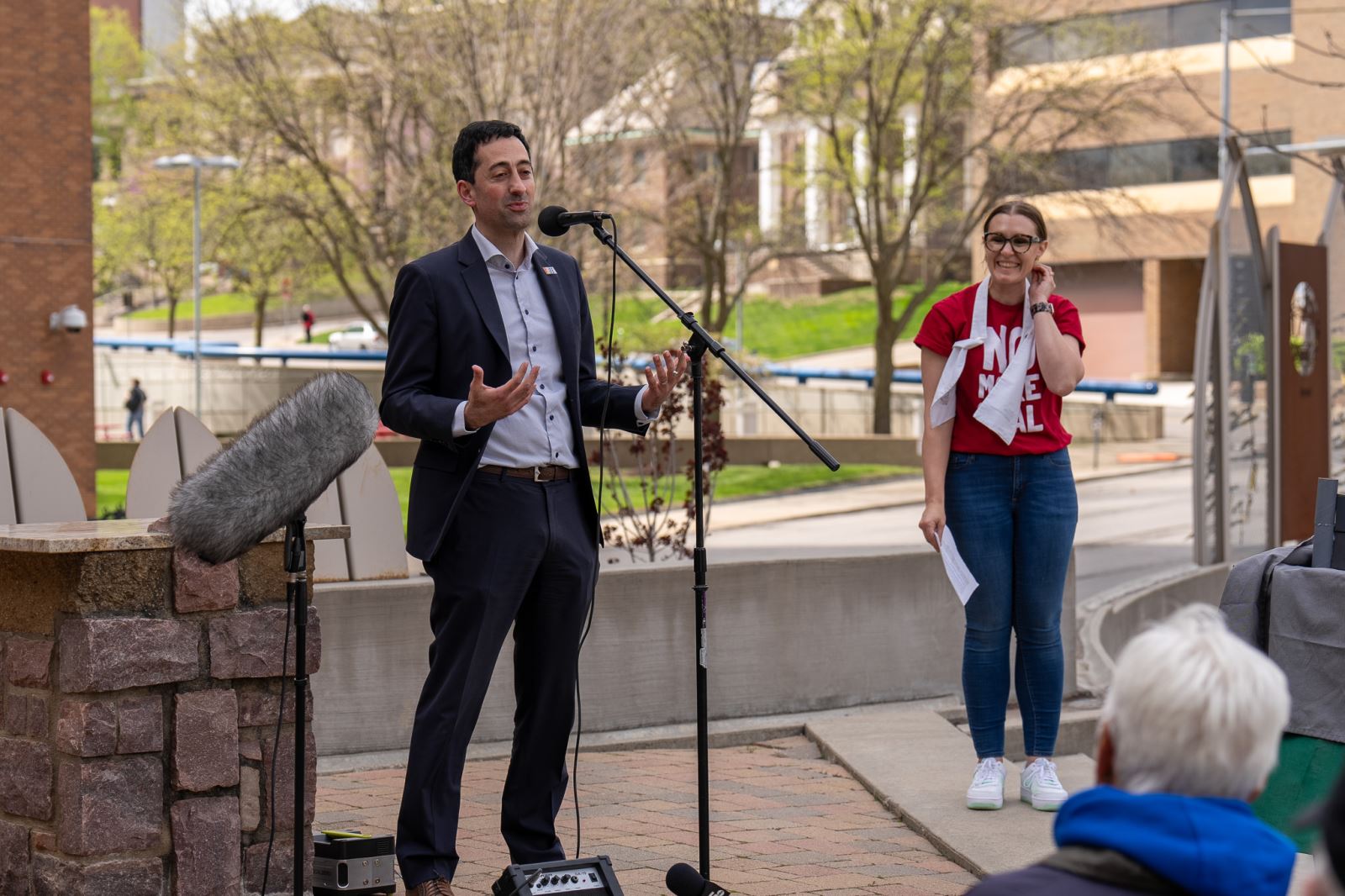 Josh Mandelbaum of ELPC speaking, Irene Demaris of Iowa IPL listening