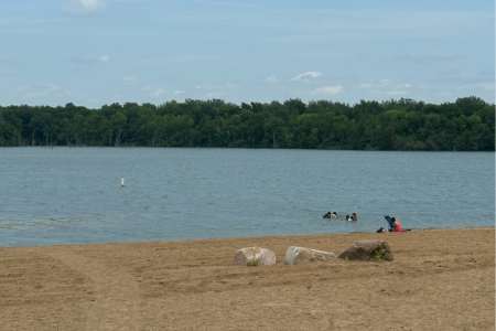 Family on beach at Brushy Creek July 2023