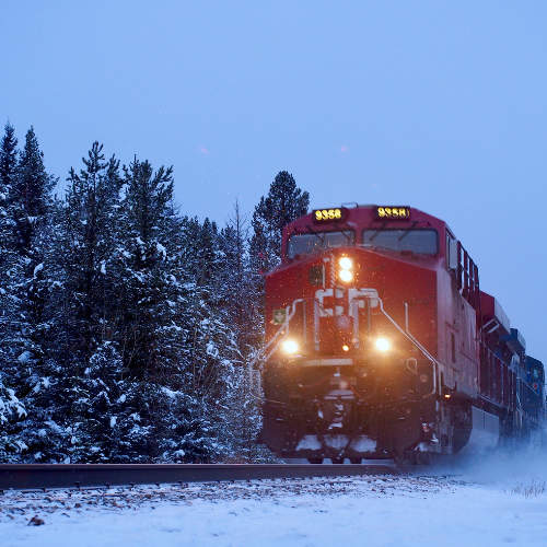 Canadian Pacific train on snowy tracks