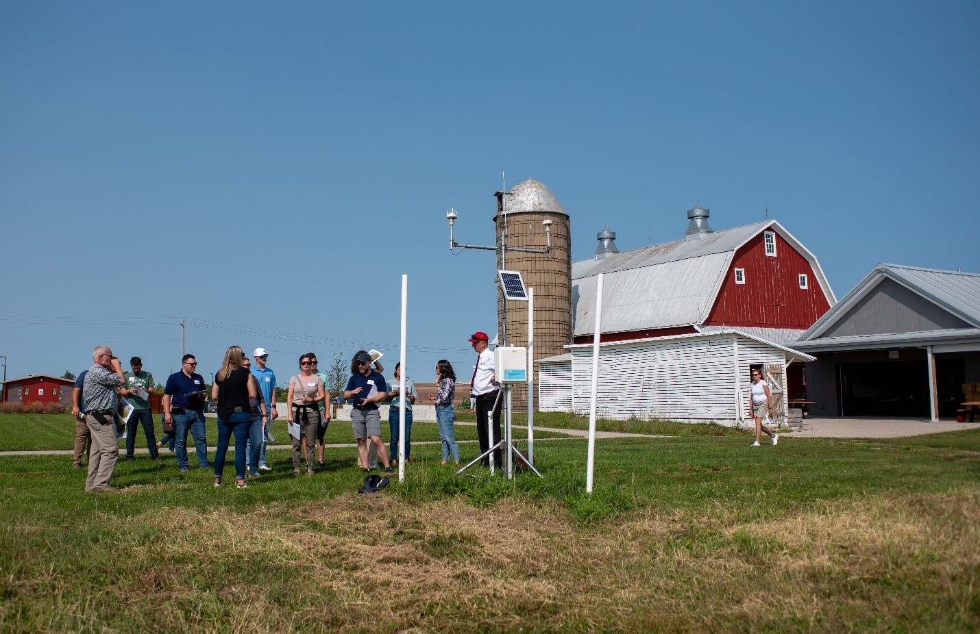 Iowa Water Conference attendees visit an IFC hydrostation in Johnson County.