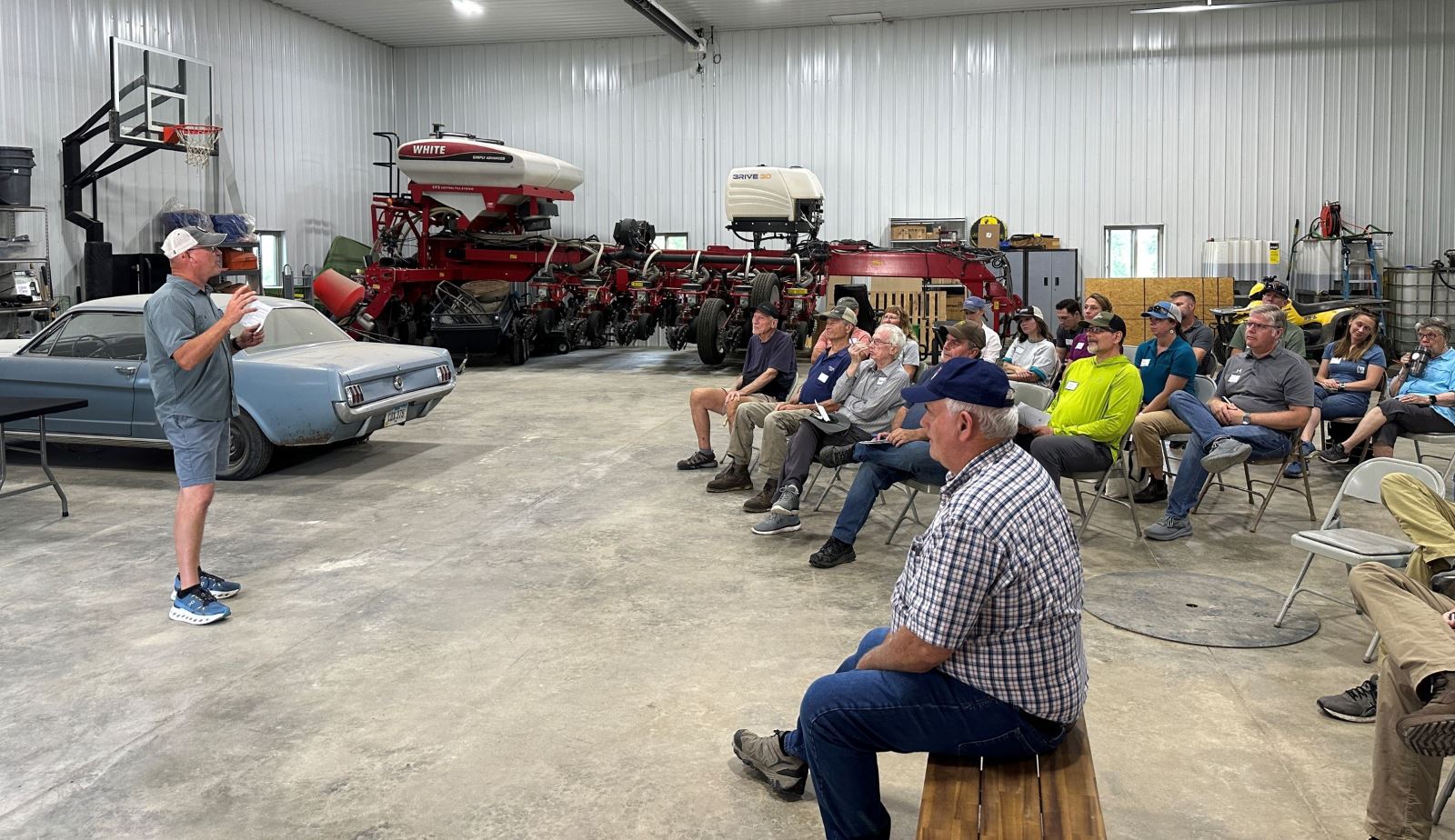 O'Connell talking in his machine shed