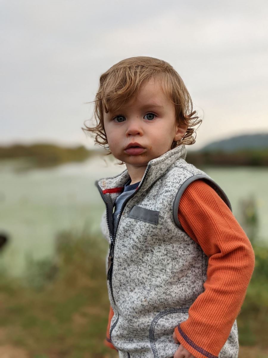 Boy playing at Mud Lake