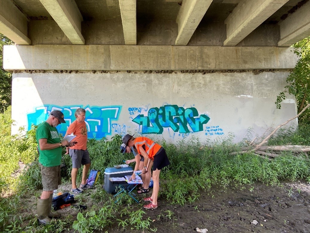 Volunteers under the bridge